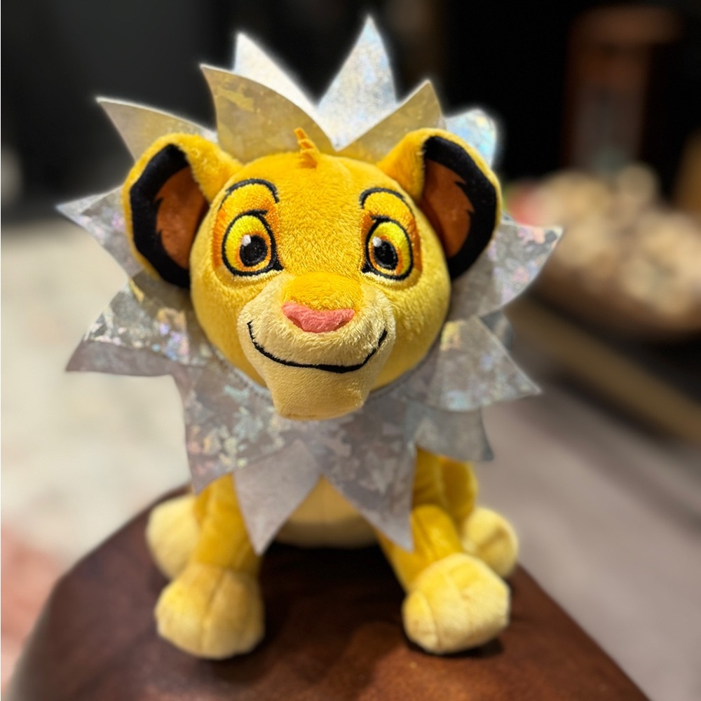 Disney 100th Anniversary Yellow Plush with Purple Badge